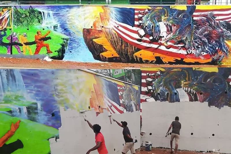   ඇමරිකානු MCC විරෝධී බිත්ති චිත්‍රය මකා දැමේ ! (Video)