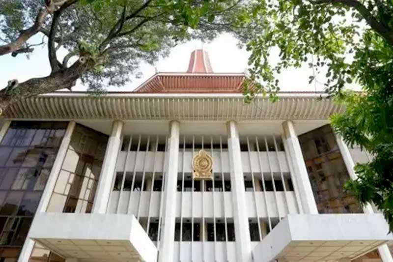 නීතිඥවරයකුගේ මූලික අයිතීන් උල්ලංඝනය කිරීම වෙනුවෙන් වන්දි ගෙවීමට පොලිසියට නියෝග