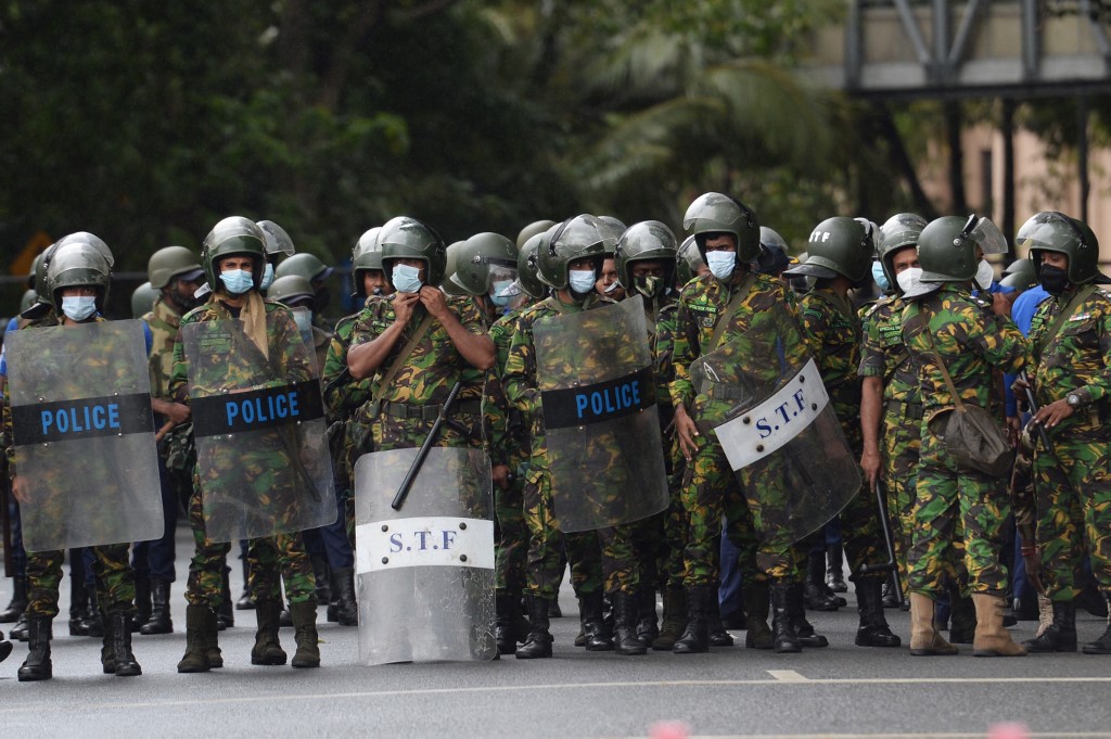 220722 Security Forces stand guard at a protest 000 32F77BG