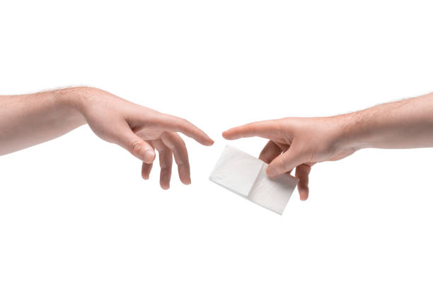 Isolated man's hands passing an item. Interaction between two people