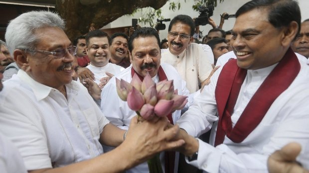 Gotabaya Mahinda and Basil Rajapaksa united by the lotus bud the party symbol