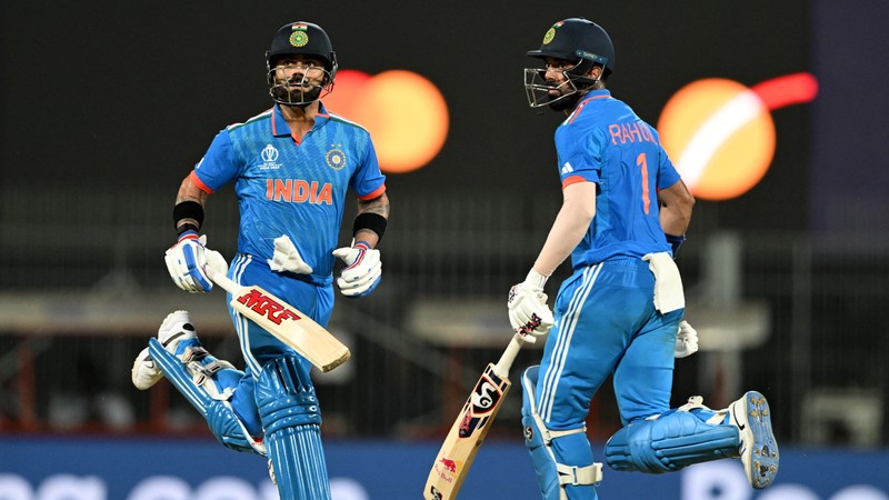 India s Virat Kohli and KL Rahul run between the wickets during their Cricket World Cup match against Australia
