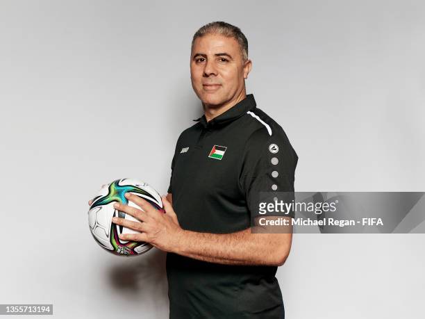DOHA, QATAR - NOVEMBER 26: Makram Daboub, Head Coach of Palestine poses during the Palestine team presentation prior to the FIFA Arab Cup Qatar 2021 at DusitD2 Salwa Hotel on November 26, 2021 in Doha, Qatar. (Photo by Michael Regan - FIFA/FIFA via Getty Images)
