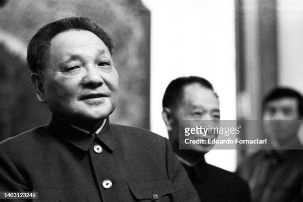 Deng Xiaoping, chairman of the chinese Peaple's political consultative conference. In the background Hu Yaobang. April 16, 1980. (Photo by Edoardo Fornaciari/Getty Images)
