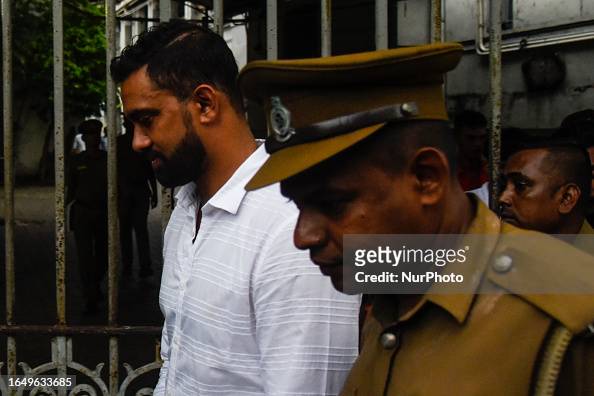 Former national cricketer Sachithra Senanayake (wearing a White Shirt) was arrested today after he surrendered to the Special Investigation Unit of the Ministry of Sports on September 6, 2023The former T20 World Cup winner has been alleged to have phoned two cricketers taking part in the first season of the Lanka Premier League (LPL) in 2020 from Dubai to request them to rig matches.The former cricketer was arrested after the Attorney General (AG) Department decided to file criminal charges against him because ''sufficient information has been disclosed under the Prevention of Offenses Related to Sports Act No. 24 of 2019.'' (Photo by Akila Jayawardena/NurPhoto via Getty Images)