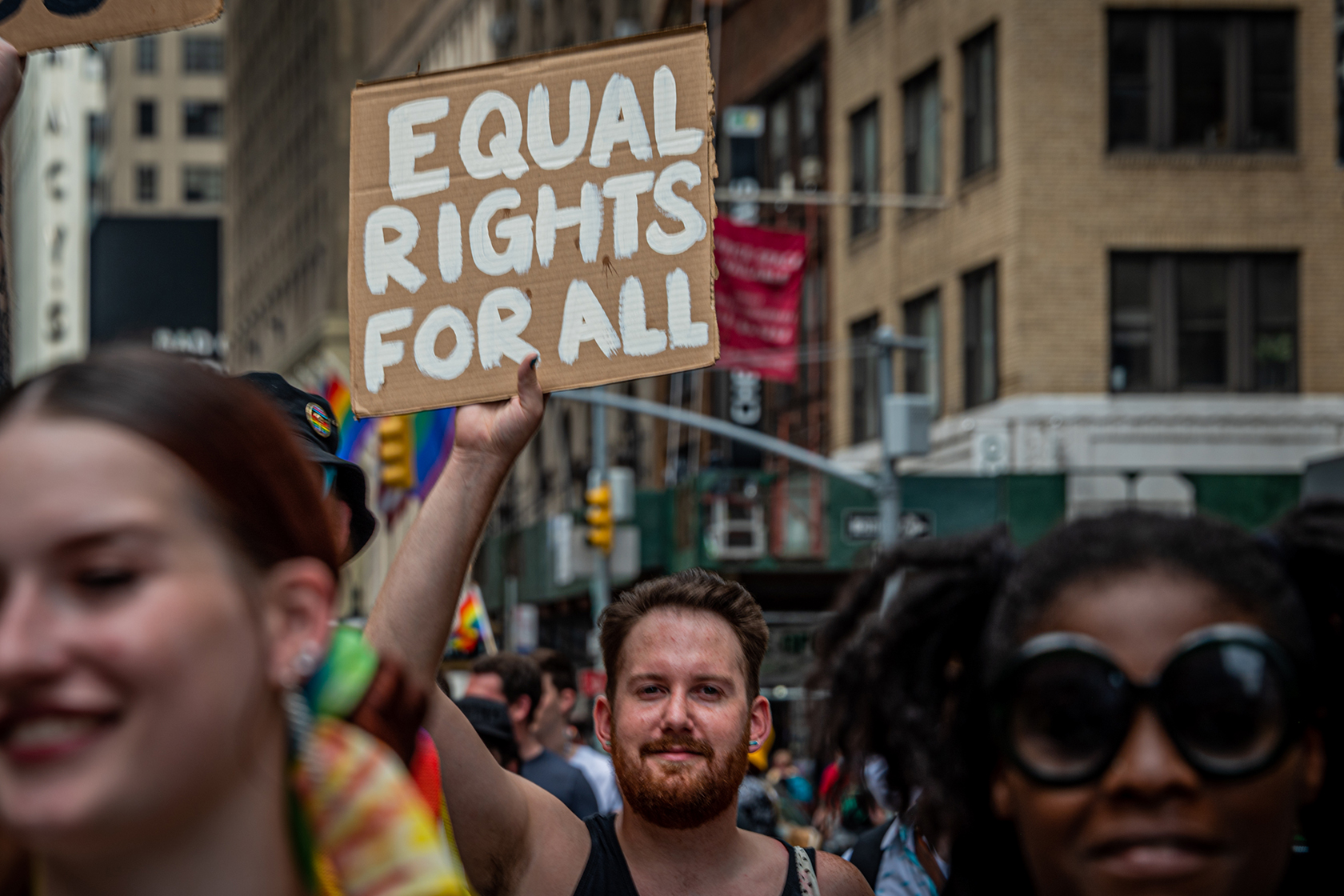 MANHATTAN, NEW YORK, UNITED STATES - 2021/06/27: A participant seen holding a sign at the march. Thousands of New Yorkers took to the streets of Manhattan to participate on the Reclaim Pride Coalition's third annual Queer Liberation March, where no police, politicians or corporations were allowed to participate. (Photo by Erik McGregor/LightRocket via Getty Images)