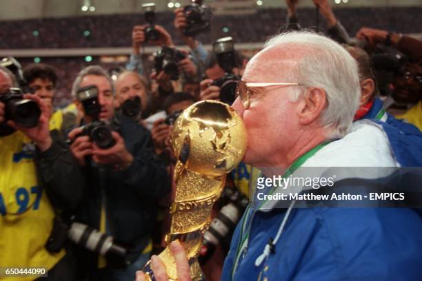 Brazil coach Mario Zagallo kisses the FIFA Confederations Cup trophy  (Photo by Matthew Ashton/EMPICS via Getty Images)