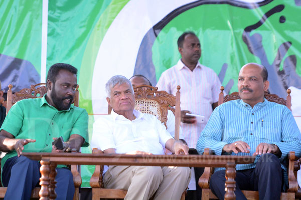 Palitha Range Bandara on the right with Ranil Wickremesinghe in the middle