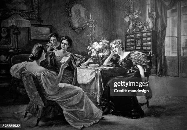 Four young women talk in the living room - 1896