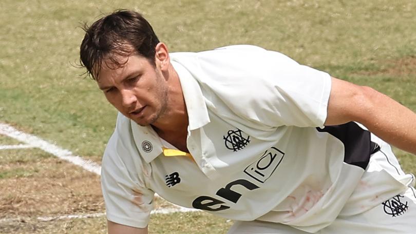 PERTH, AUSTRALIA - OCTOBER 21: Hilton Cartwright of Western Australia fields the ball off his bowling during the Sheffield Shield match between Western Australia and Tasmania at the WACA Ground, on October 21, 2024, in Perth, Australia. (Photo by Paul Kane/Getty Images)