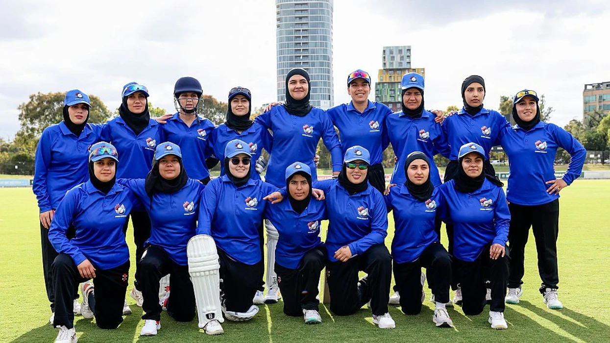 file photo afghanistan women s xi players pose for a team photo during the cricket match between afghanistan women s xi and cri