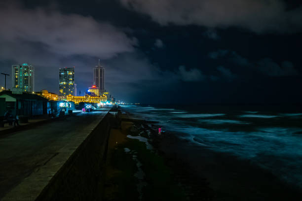 Street vendors selling their wares on Galle Face Green in Colombo, Sri Lanka by the Indian Ocean, in the evening