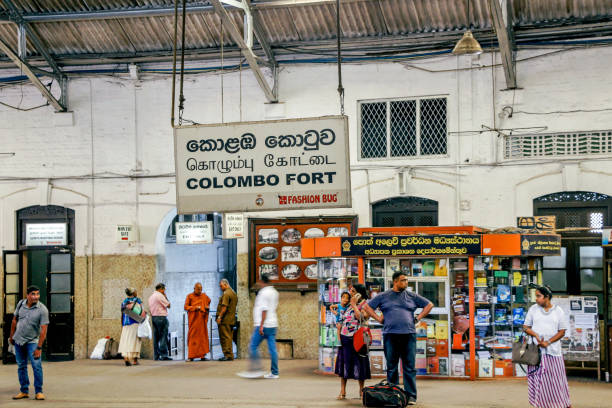 Colombo, Sri Lanka - March 04, 2019: People waiting for train at busy train station in Colombo