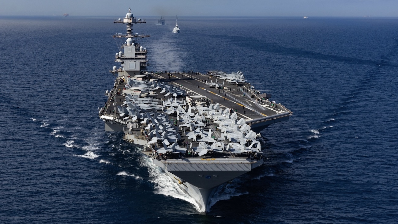 From front to back, the world’s largest aircraft carrier, USS Gerald R. Ford (CVN 78), Royal Moroccan Navy Floreal-class frigate Mohammed VI (701), and Military Sealift Command fast combat support ship USNS Supply (T-AOE 6), steam in formation while transiting the Strait of Gibraltar, Oct. 1, 2025. Gerald R. Ford, a first-in-class aircraft carrier and deployed flagship of Carrier Strike Group Twelve, is on a scheduled deployment in the U.S. 6th Fleet area of operations to support the warfighting effective
