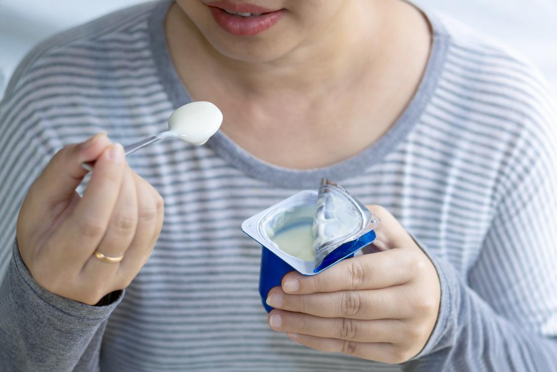 a woman eating yogurt for diabetes