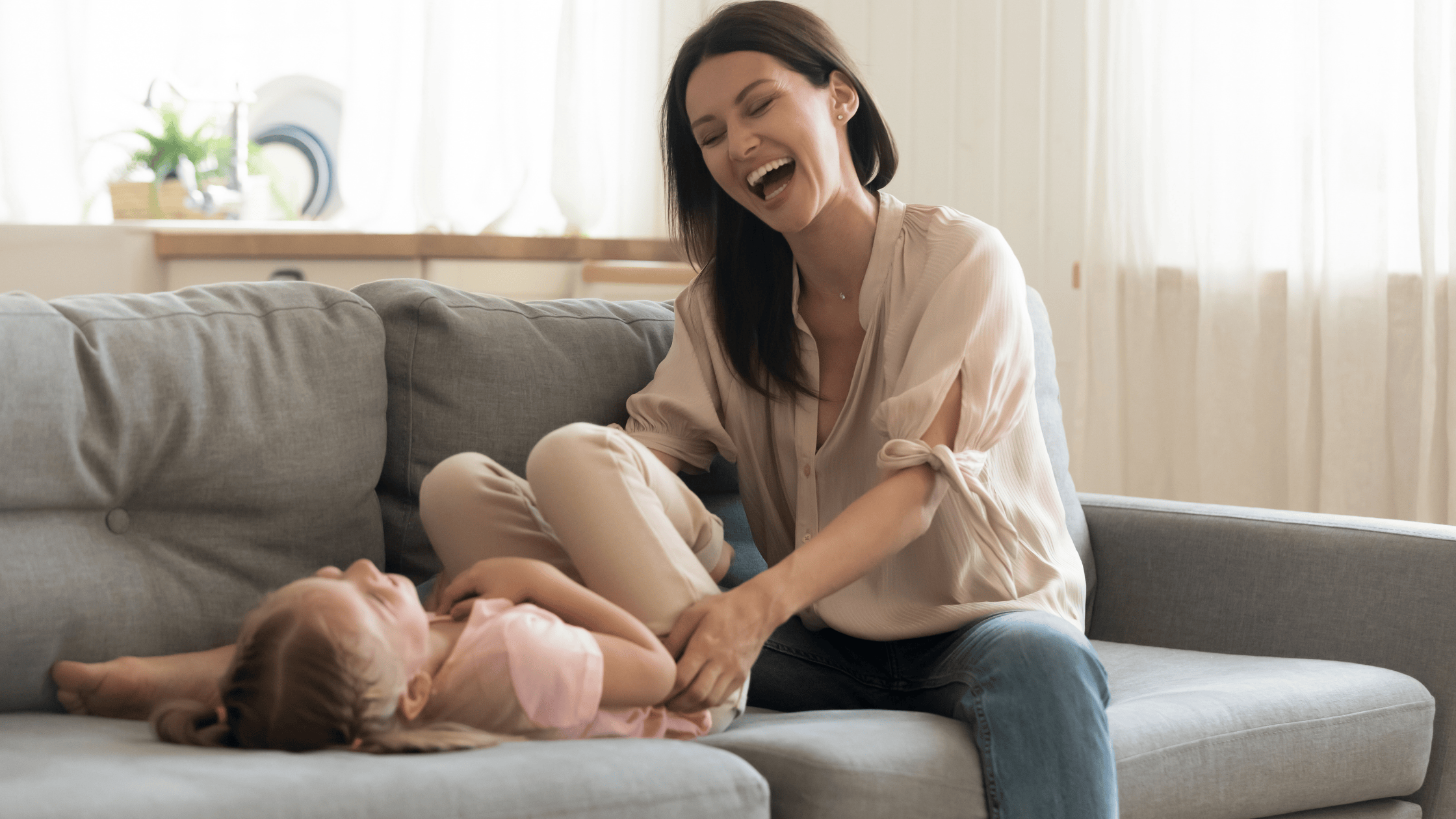 mother and daughter laghing