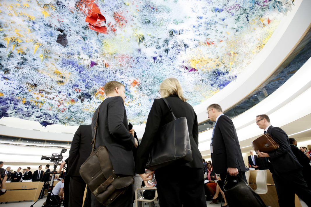 epa08242991 Delegates arrive in the assembly hall prior the opening of the High-Level Segment of the 43rd session of the Human Rights Council, at the European headquarters of the United Nations (UNOG) in Geneva, Switzerland, 24 February 2020.  EPA-EFE/SALVATORE DI NOLFI