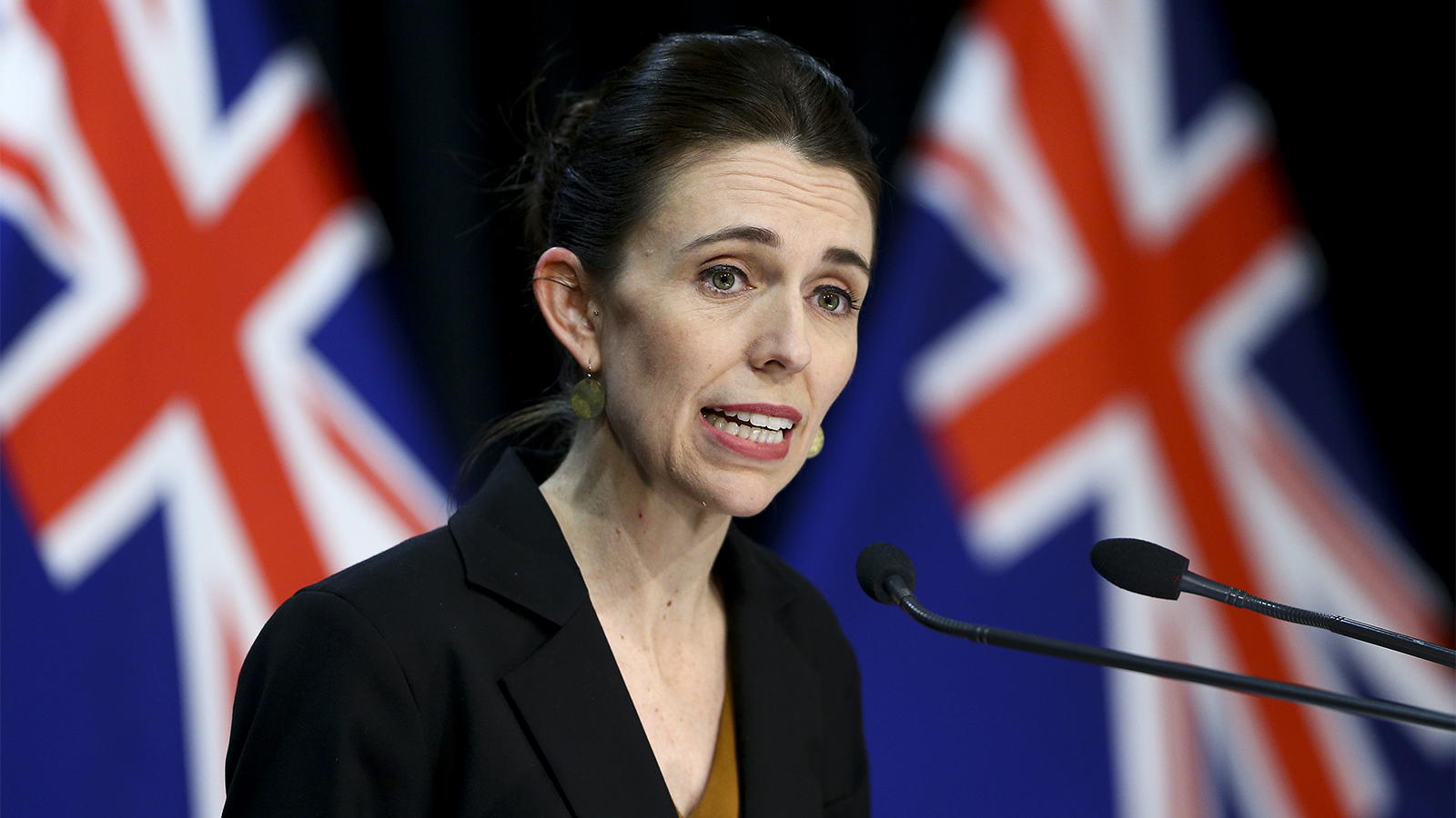 WELLINGTON, NEW ZEALAND - AUGUST 24: Prime Minister Jacinda Ardern speaks to media during a press conference at Parliament on August 24, 2020 in Wellington, New Zealand. Prime Minister Jacinda Ardern announced an extension to the current COVID-19 Alert Levels as the country hits day 13 of increased restrictions following an outbreak. Auckland will remain in Alert Level 3 until Sunday 30 August at 11:59pm while the rest of the country will remain in level 2.  (Photo by Hagen Hopkins/Getty Images)