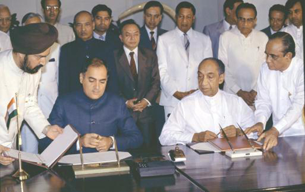 LANDMARK AGREEMENT: Prime Minister Rajiv Gandhi and Sri Lankan President J.R. Jayewardene sign the India-Sri Lanka Agreement in Colombo on July 29, 1987.  Photo: N. Ram